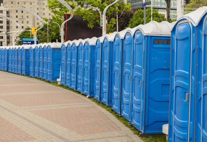 a row of portable restrooms at a fairground, offering visitors a clean and hassle-free experience in North Zulch